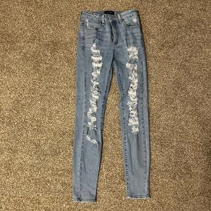 Size 0 ripped skinny jeans from Just USA.